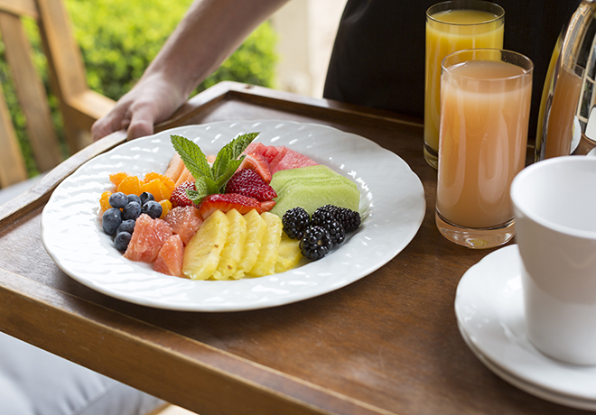 Bed and Breakfast fruit platter with orange juice and grapefruit juice